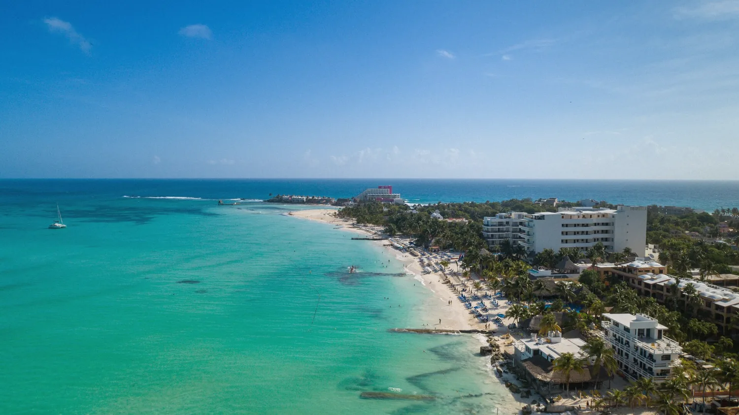 White sand and pale turquoise water at Playa Norte on Isla Mujeres, Mexico
